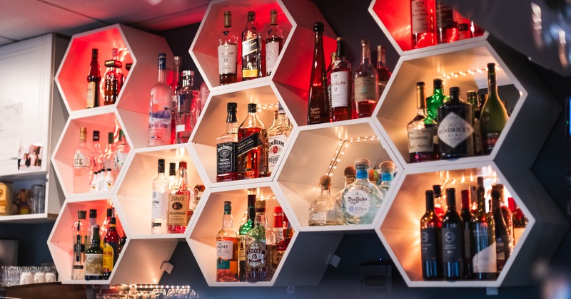 Honeycomb drink rack above the bar