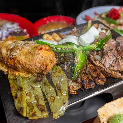 Mix of Mexican barbecue foods.