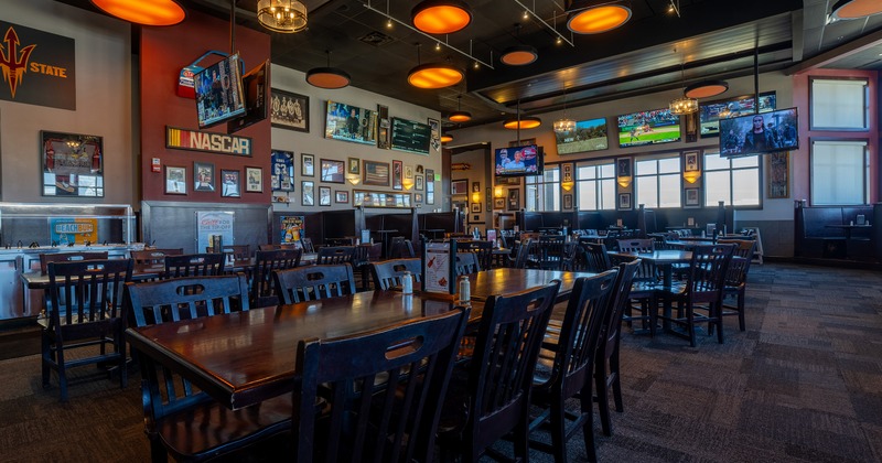Interior of spacious and cozy sports bar dining area