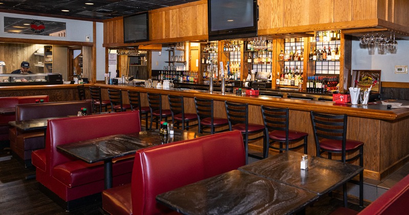 Booth tables and a bar