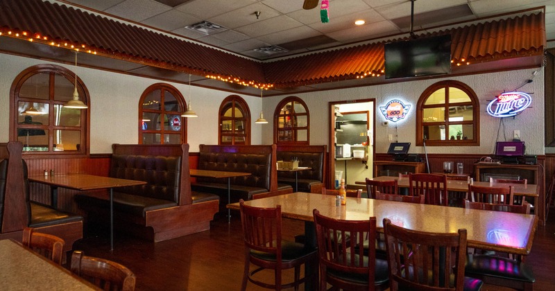 Interior, dining area, tables with chairs, seating booths, waiter serving stations