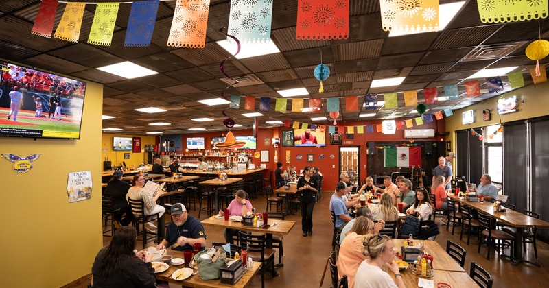 Diner area, tables, chairs, guests