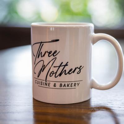 A cup with the restaurant's name on it.