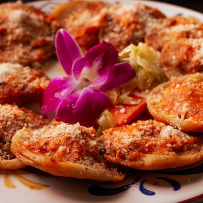 Garnachas on a plate, close up.