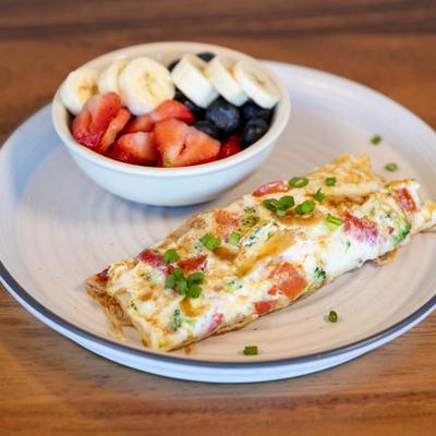 Healthy omelet, served, front view.