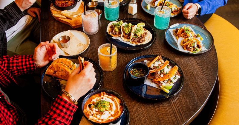 Customers eating and drinking