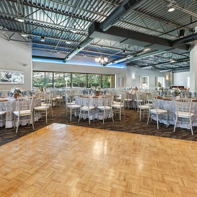 Dance floor with tables in background