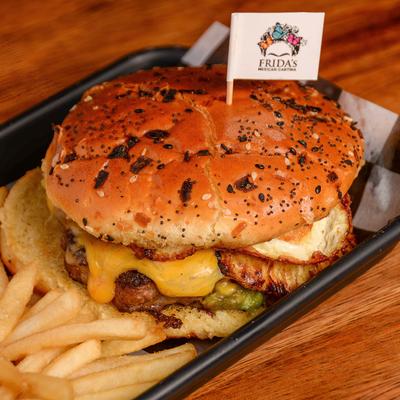 Frida's Burger with pinapple and fried egg.