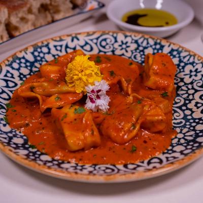 Ravioli stuffed with ricotta and spinach in a vodka sauce with porcini mushrooms.