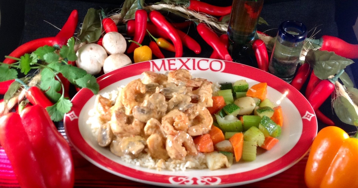 Grilled shrimp with special cream sauce, served with cooked vegetables