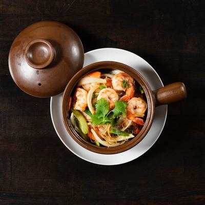 Glass noodles, with shrimp, ginger, carrots, celery, scallions, and garlic.