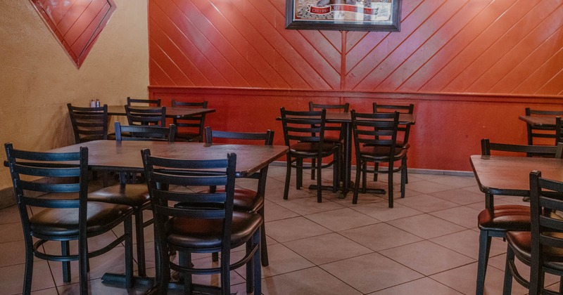 Interior seating area with chairs and tables