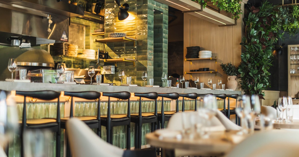 Interior, bar area, tables and chairs