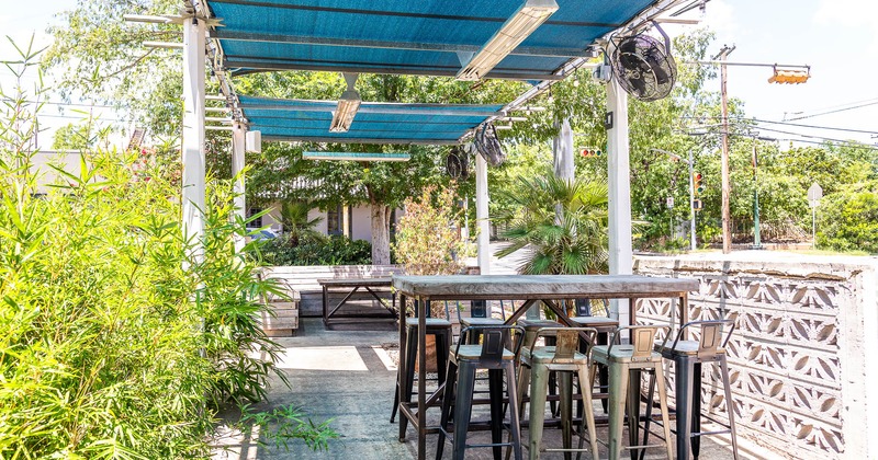 Exterior, high tables and chairs on patio