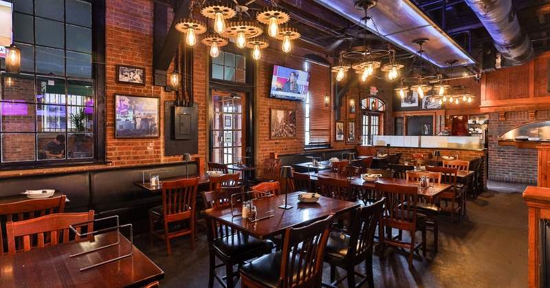 Nicely done interior dining area with tables ready for guests