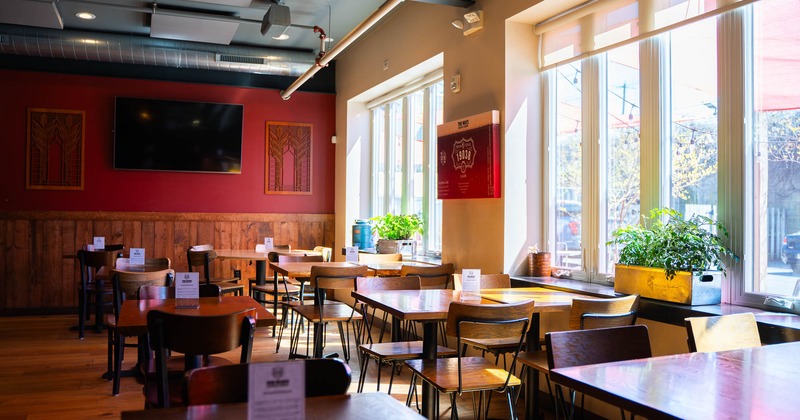 Interior, main seating area, big TV on the wall