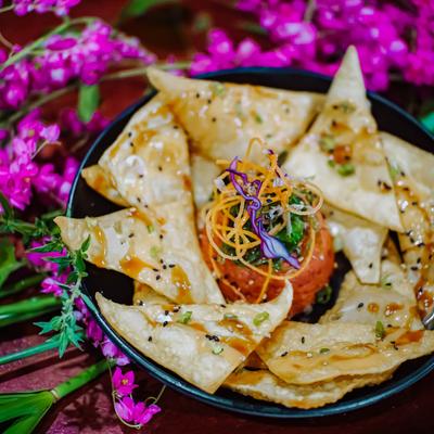 Tuna Poke Nachos served