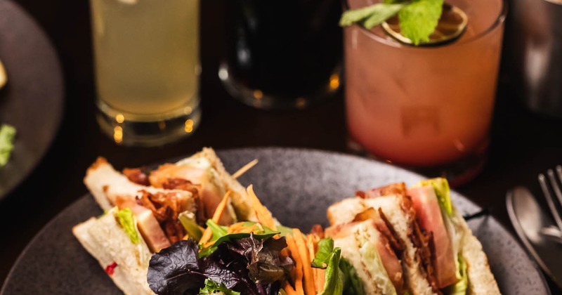 BLT sandwich plate and cocktails