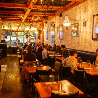 Diner area, tables and chairs, wide view.