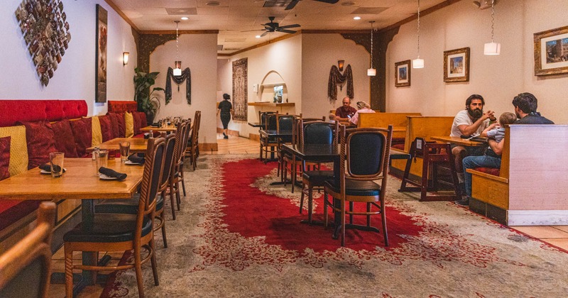 Interior, tables and chairs set for guests