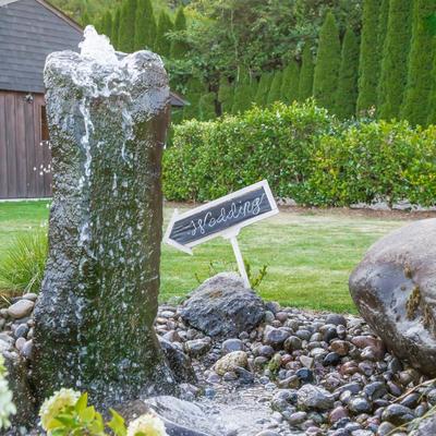 Decorations in grass area - fountain
