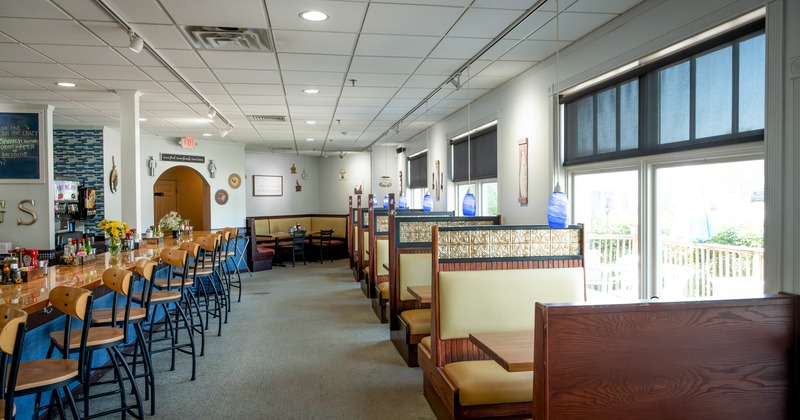 Diner area, tables, bar stools, booths, wide view