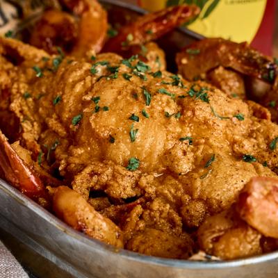 Fried seafood platter with shrimp and lobster.