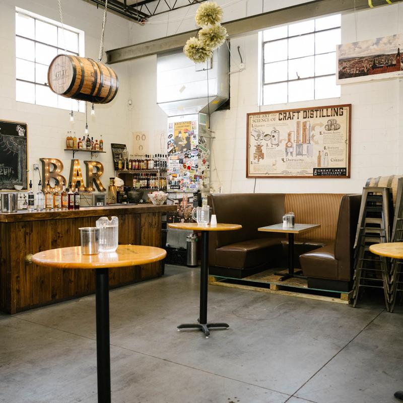 Interior, bar area, wooden top tables, seating booth, wooden top bar