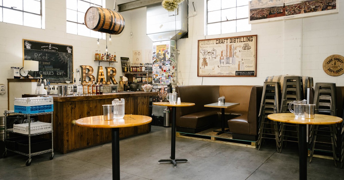 Interior, bar area, wooden top tables, seating booth, wooden top bar