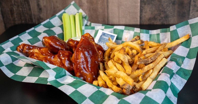 BBQ wings with celery and fries