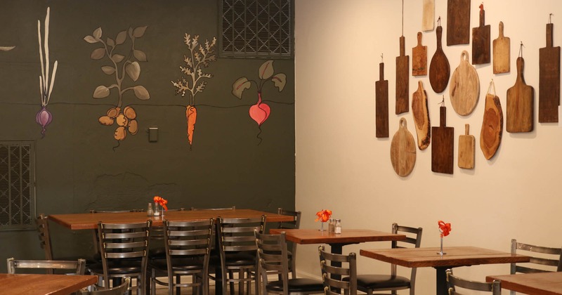 Dining area, tables and chairs in the corner