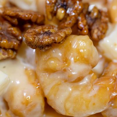 Creamy shrimp with candied walnuts.