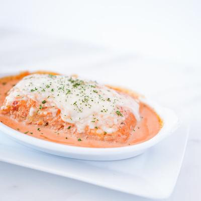 Chicken lasagna in pink sauce.