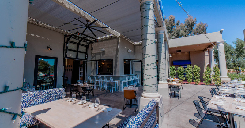 Outdoor dining area with set tables