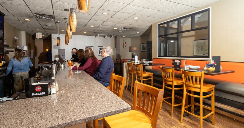 Interior, part of bar, diner area behind