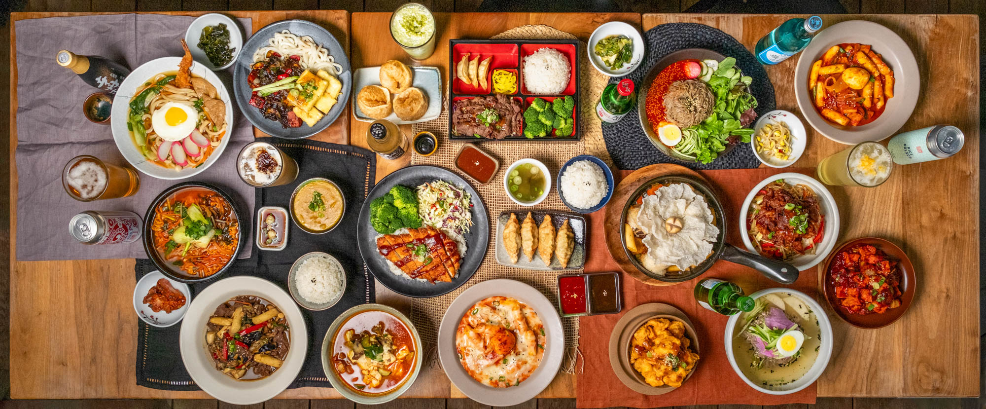 An assortment of dishes arranged on a table, top view