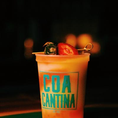 A cocktail drink served in a cup