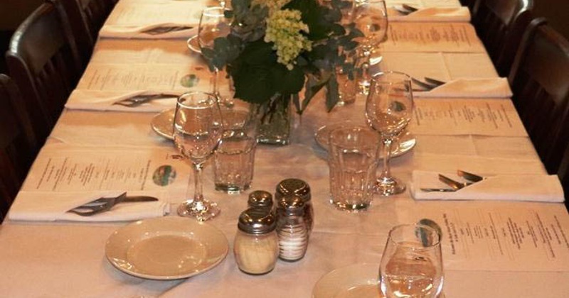 Dining area, fully set tables