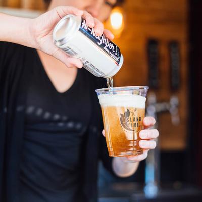 Bartender pouring a glass of beer.