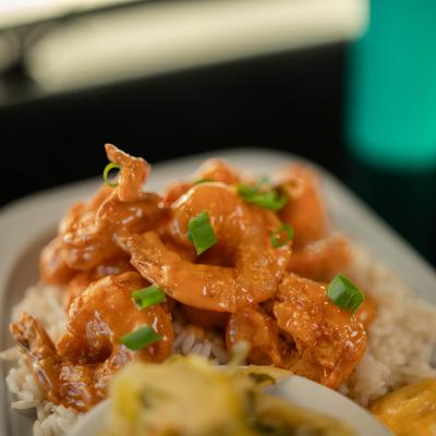 Shrimp tossed in Bang Bang sauce, served with rice.