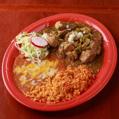 Tender pork in green sauce, served with rice and beans