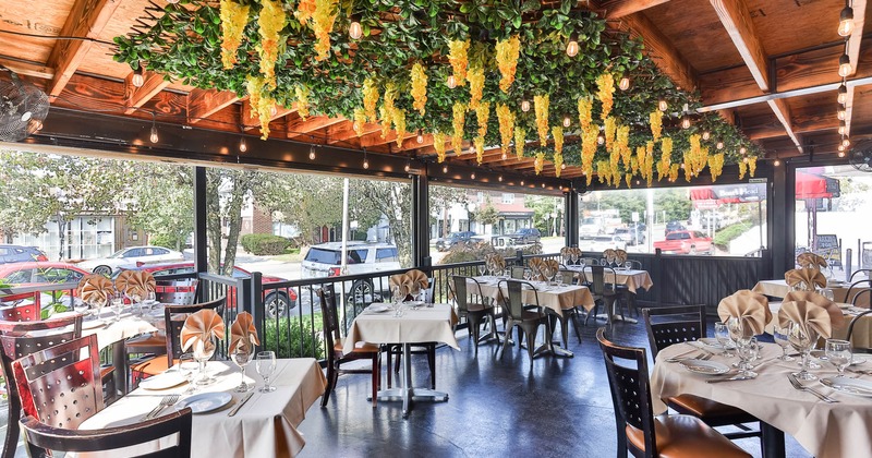 Exterior, patio, seating area, lanterns and floral decoration on the ceiling