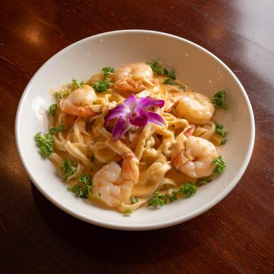 Shrimp pasta in lobster cream sauce.