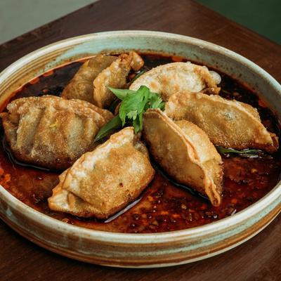 Fried Dumpling with chili soy sauce.