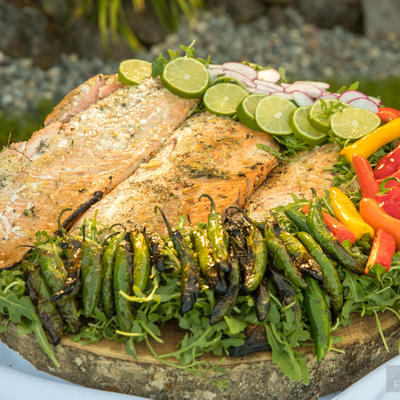 Grilled fish with chili peppers and cucumbers