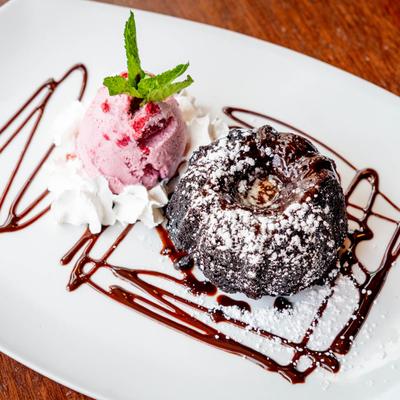 Lava cake with ice cream and whipped cream