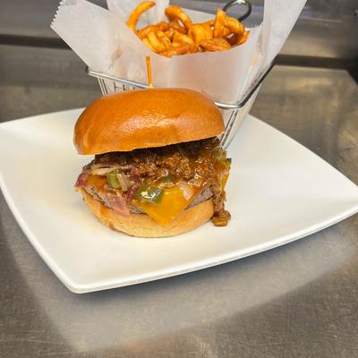 BBQ-style burger served with fries.