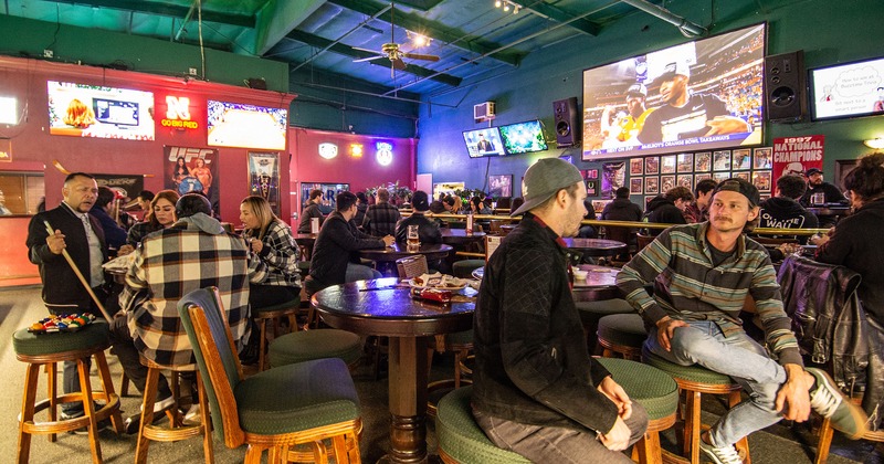 Interior, guests chatting and enjoying their drinks