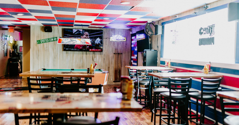 Dining tables with a pool table area