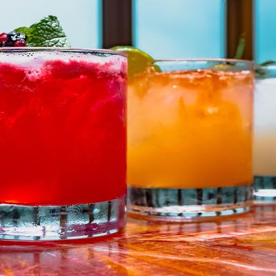 Strawberry Mint Gimlet,Tangy Tiki Punch, and  So Peachy side by side.